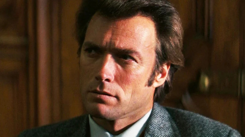 Harry Callahan (Clint Eastwood) looks up while seated in an office in Dirty Harry