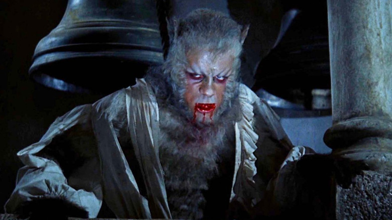 Oliver Reed as Leon as a werewolf in a bell tower in The Curse of the Werewolf