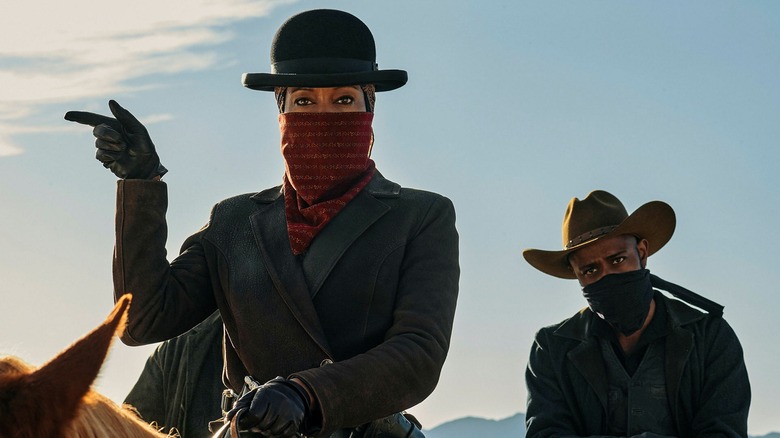 Regina King as Trudy and LaKeith Stanfield as Bill, giving orders in The Harder They Fall