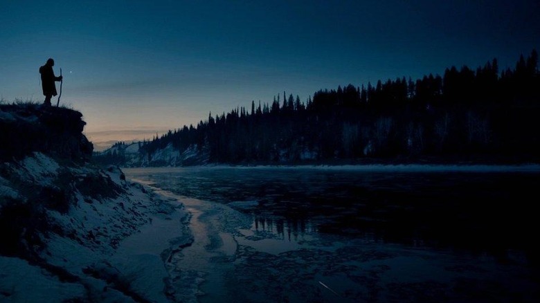 Leonardo DiCaprio as Hugh, silhouetted against dusk in The Revenant