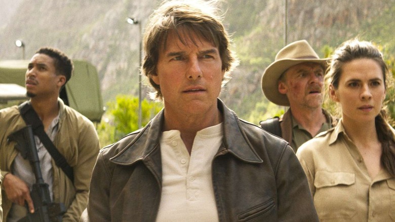Tom Cruise as Ethan Hunt, standing with the IMF in Mission: Impossible -- The Final Reckoning.