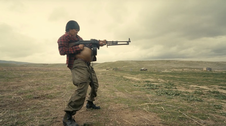 Teyana Taylor as Perfidia Beverly Hills, pregnant and firing a machine gun in One Battle After Another.