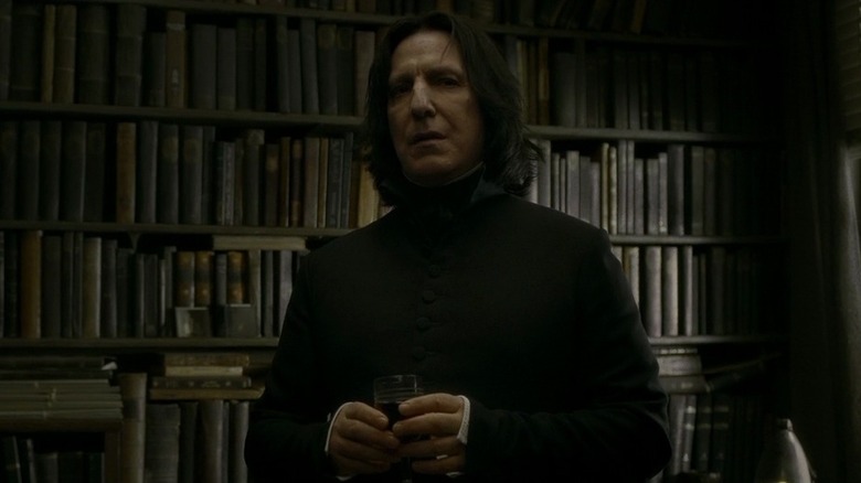 Snape (Alan Rickman) in front of a bookcase in Harry Potter and the Half-Blood Prince