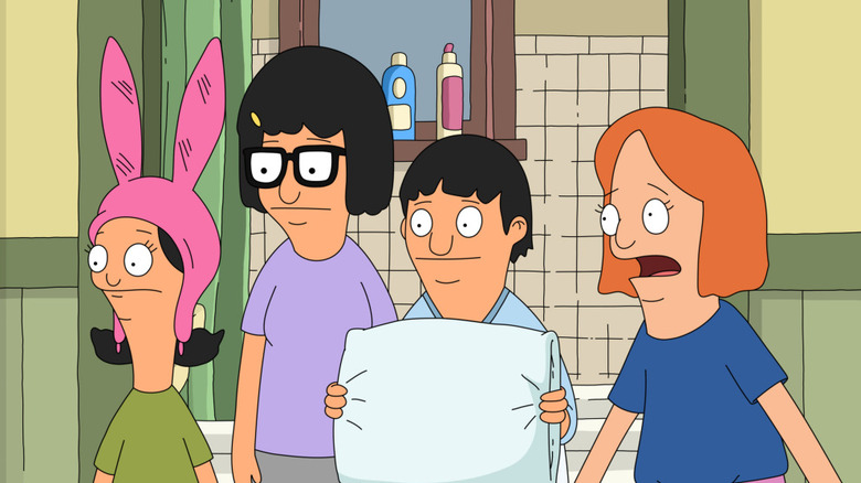 Louise, Tina, and Gene stand next to a distressed girl
