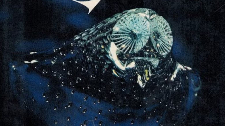 A mirror owl glitters on the cover of Shadowland by Peter Straub