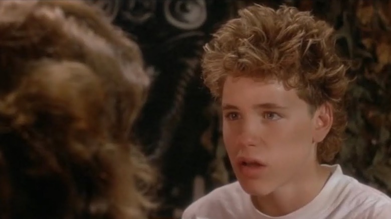 Cory Haim as Travis, the kid that will bond the hyper smart dog Einstein in Watchers