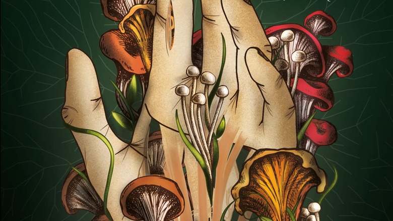 A hand entwined with fungi on a special cover for What Moves The Dead