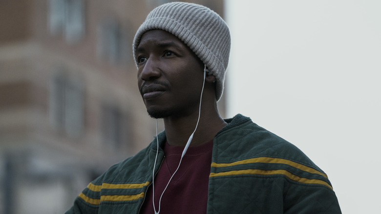 Dan (Mamoudou Athie) looking on seriously in Archive 81