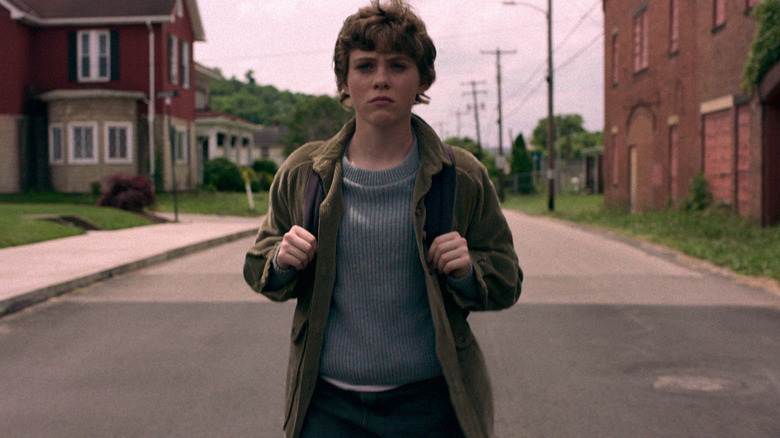 Sydney (Sophia Lillis) standing in the street on I Am Not Okay With This