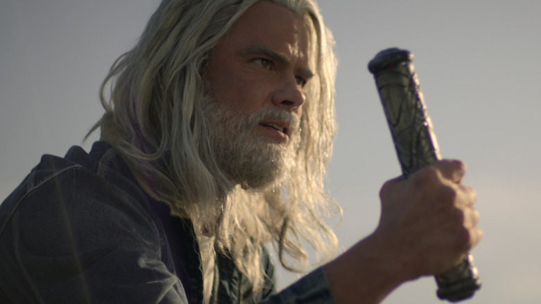 Sheldon Sampson (Josh Duhamel) holding a screed on Jupiter's Legacy