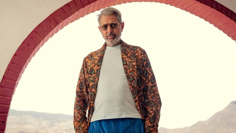 Zeus (Jeff Goldblum) in a doorway on Kaos