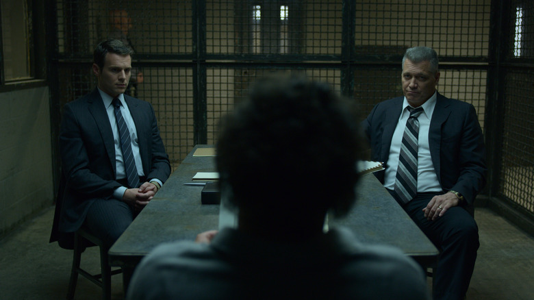 Holden (Jonathan Groff) and Bill (Holt McCallany) interviewing someone in prison on Mindhunter