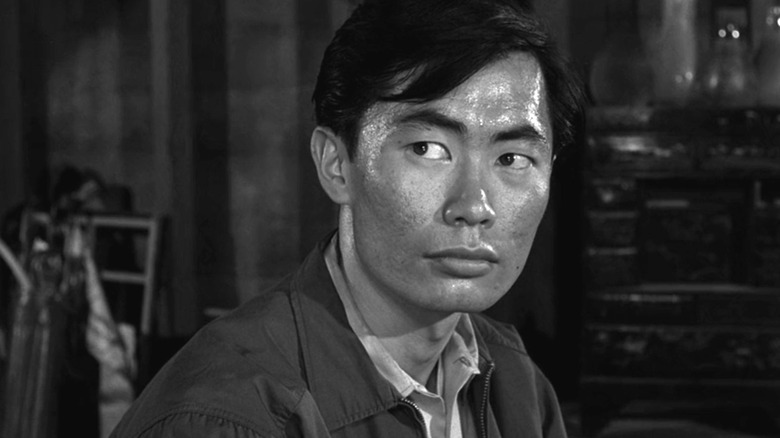 Arthur Takamori (George Takei) looking over his shoulder on The Twilight Zone
