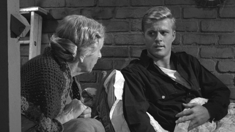Harold (Robert Redord) lying in bed talking with Wanda (Gladys Cooper) on The Twilight Zone