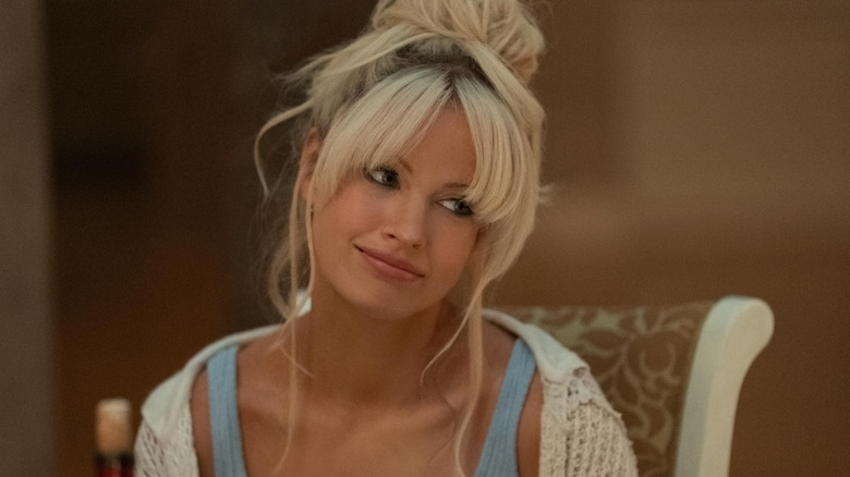Pam Anderson (Lily James) smiling in Pam & Tommy