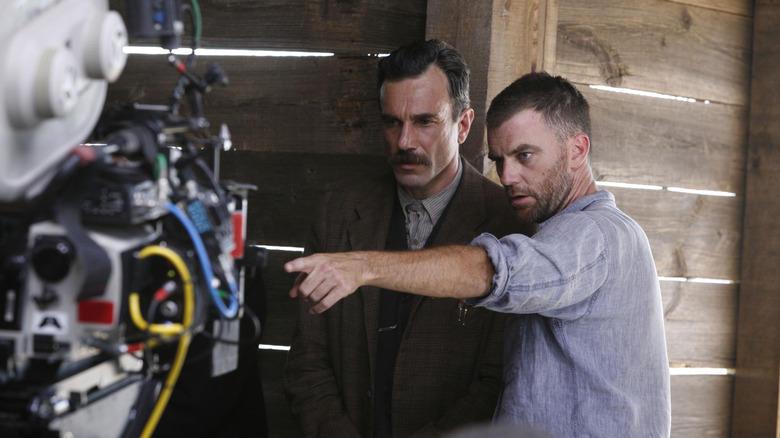Paul Thomas Anderson directing Daniel Day Lewis on set of There Will Be Blood