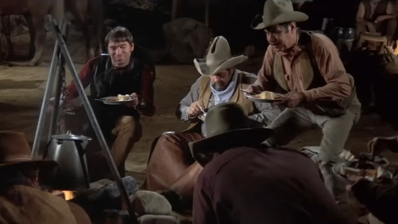 Cowboys eating beans in Blazing Saddles