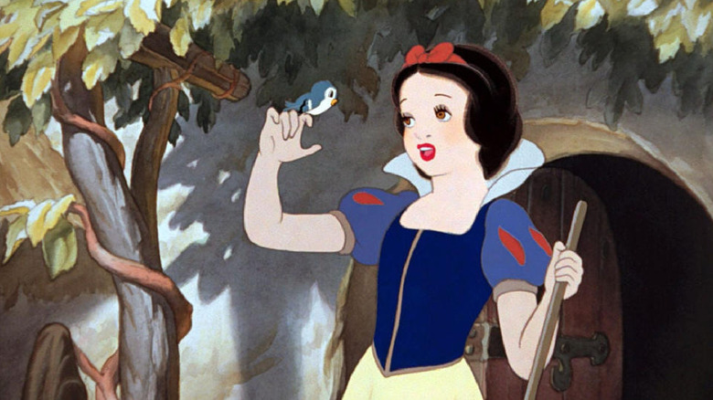 Snow White singing to a bird in Snow White and the Seven Dwarfs