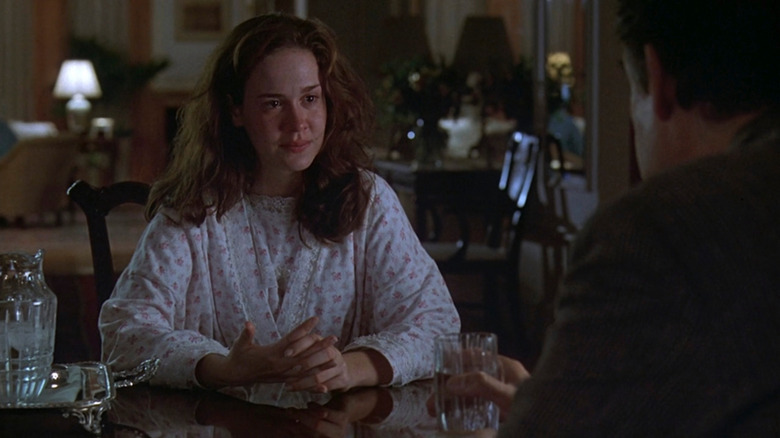 Sarah Paulson as Maggie being interviewed on Law and Order