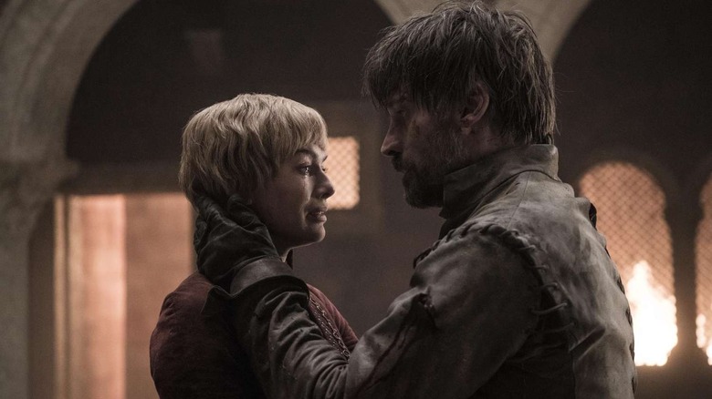 Lena Headey and Nikolaj Coster-Waldau as Cersei and Jaime embracing in Game of Thrones