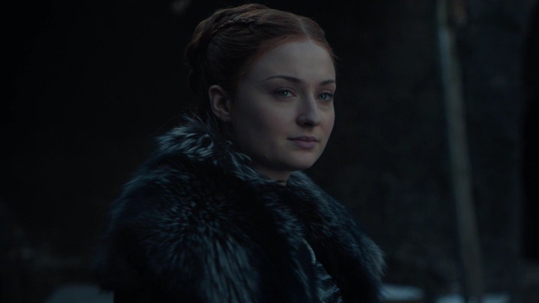 Sophie Turner as Sansa smiling in Game of Thrones