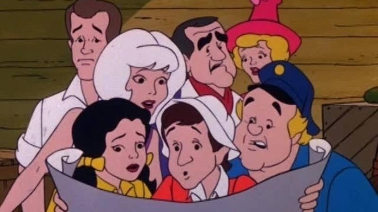 The castaways looking at a map on Gilligan's Planet