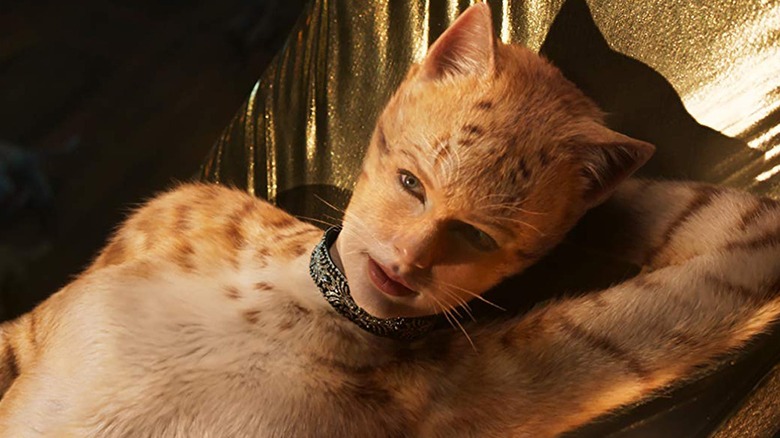 Taylor Swift as Bombalurina lying back in Cats