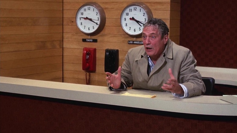 Peter Finch as Howard, losing it on the news in Network