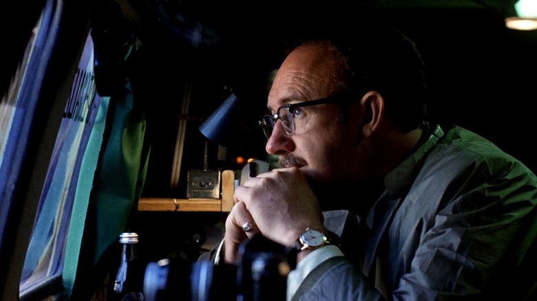 Gene Hackman as Harry, watching other people in The Conversation