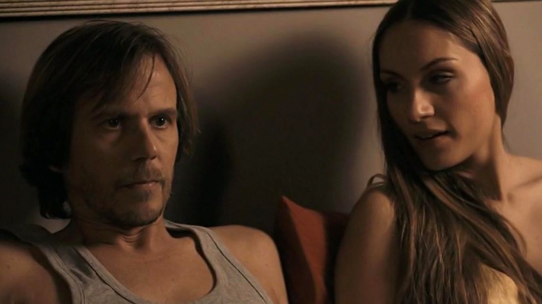 Srdjan Todorovic as Milos and Jelena Gavrilovic as Marija, talking about their future in A Serbian Film