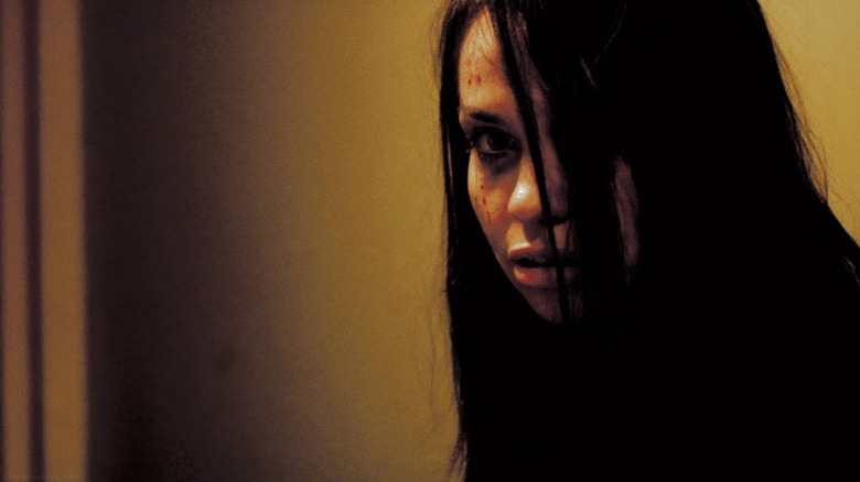 Beatrice Dalle as the woman, about to commit more violence in Inside