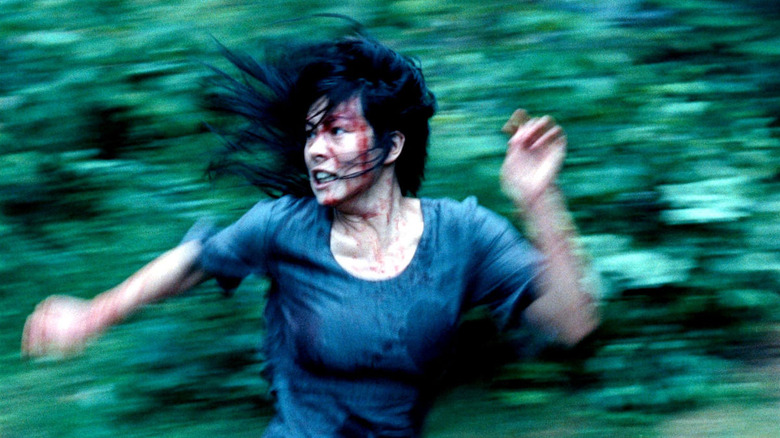 Jessie Pham as young Lucie, running away in Martyrs