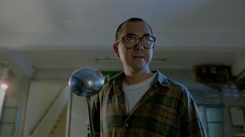 Anthony Wong as Chi-hang, holding a ladle in The Untold Story