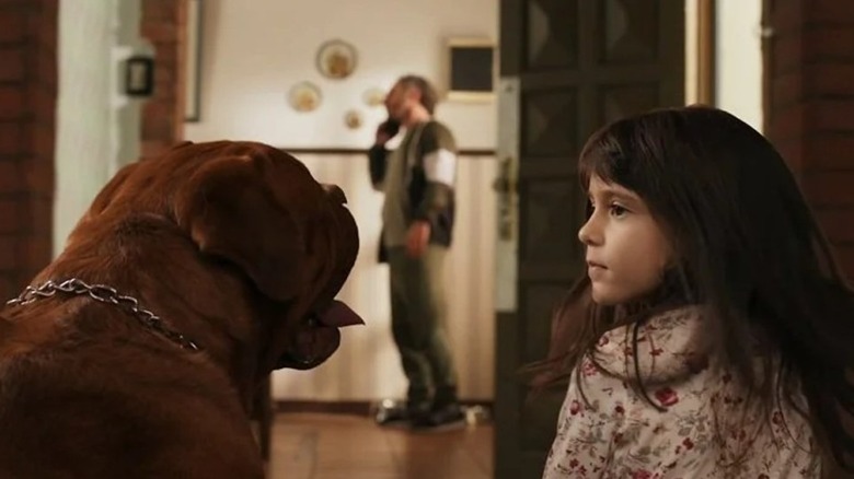 a girl and her pup, hanging out in When Evil Lurks