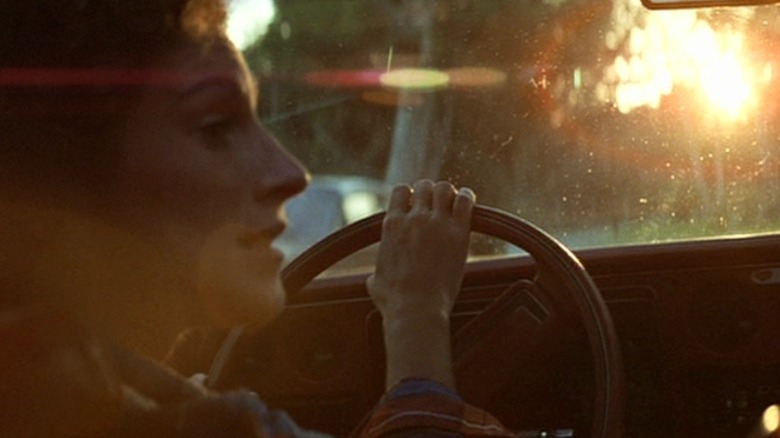 Annie (Nancy Loomis) driving her car at sunset in Halloween