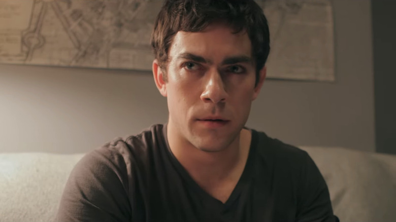 Evan Dumouchel as Christian looking concerned in They Look Like People