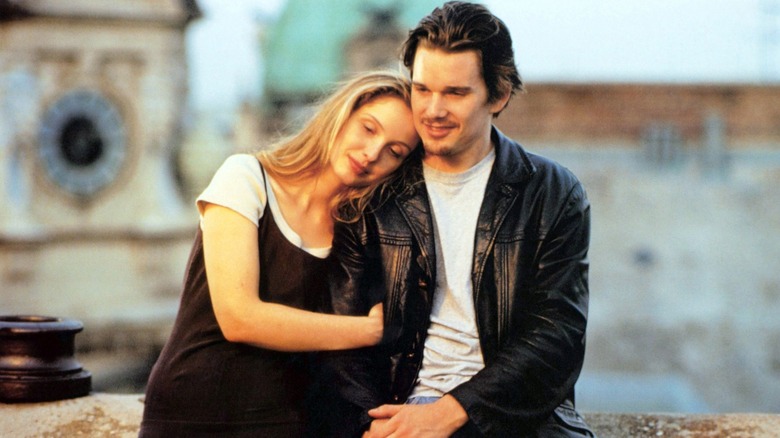 Julie Delpy resting head on Ethan Hawke's shoulder