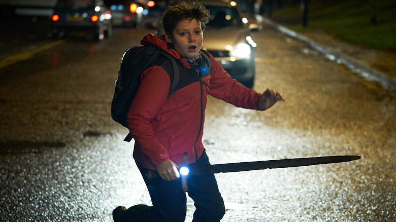 Louis Ashbourne Serkis runs with sword