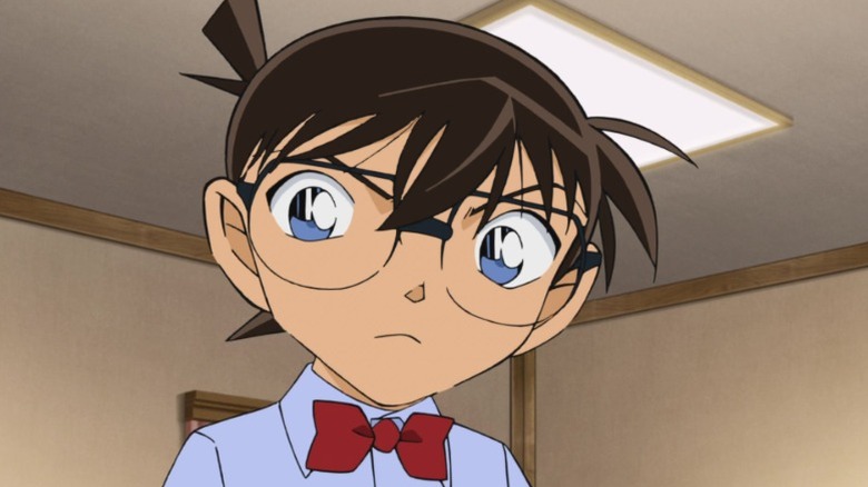 Shinichi Kudo in his Conan Edogawa form furrowing his brows on Detective Conan