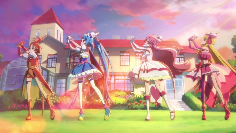 Cure Wing, Dark Sky, Cure Prism, and Cure Butterfly mimicking butterflies with their hands on Soaring Sky! Pretty Cure