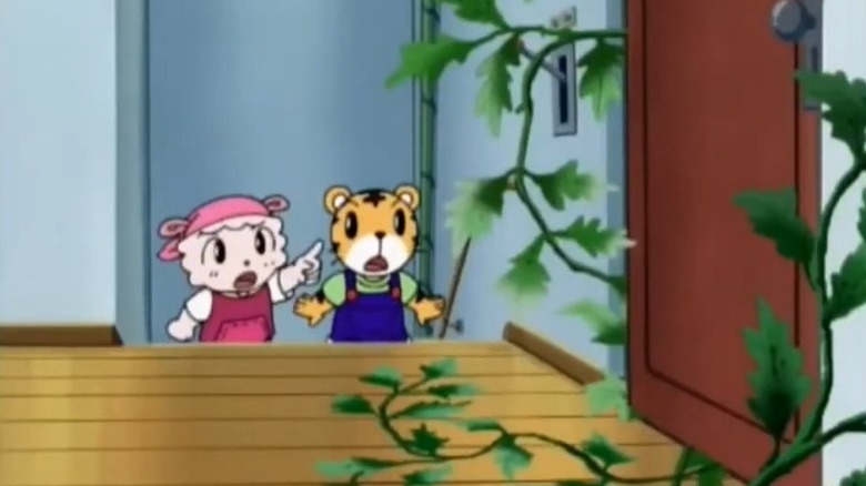 Ramurin Makiba and Shimajiro Shimano gazing in shock at a vine-covered door on Shima Shima Tora no Shimajirou