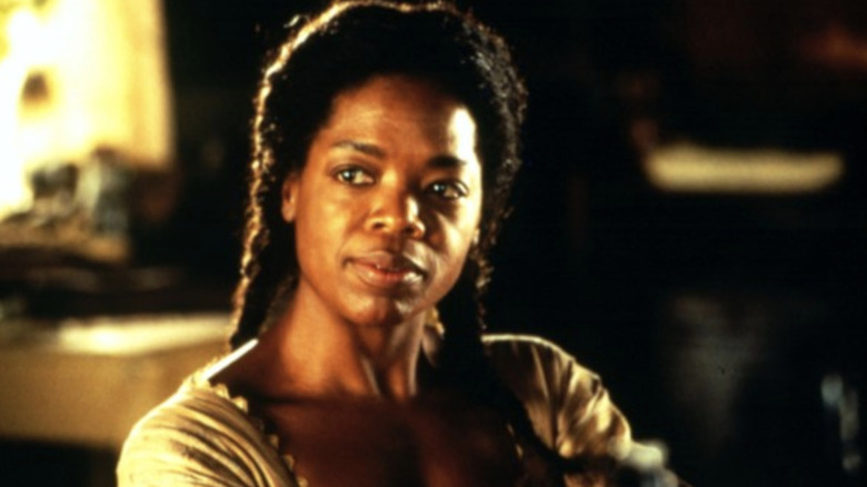 Sethe (Oprah Winfrey) listens in Beloved