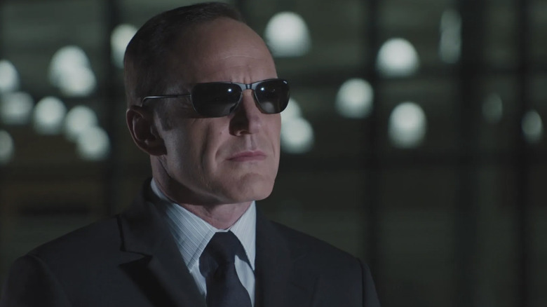 Clark Gregg as Phil Coulson weearing sunglasses in The Avengers