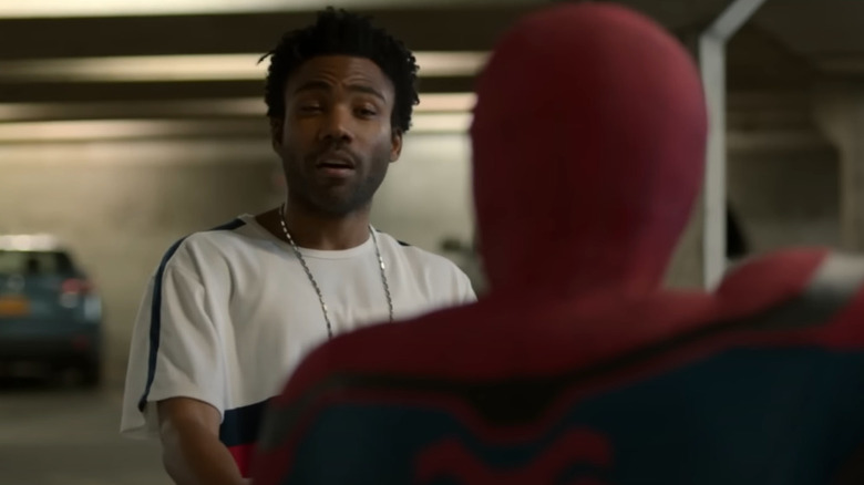 Donald Glover as Aaron Davis side-eying Spider-Man in Spider-Man: Homecoming