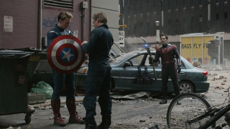 Chris Evans as Captain America, Robert Downey Jr. as Tony Stark, and Paul Rudd as Ant-Man, preparing to time travel in New York in Avengers: Endgame