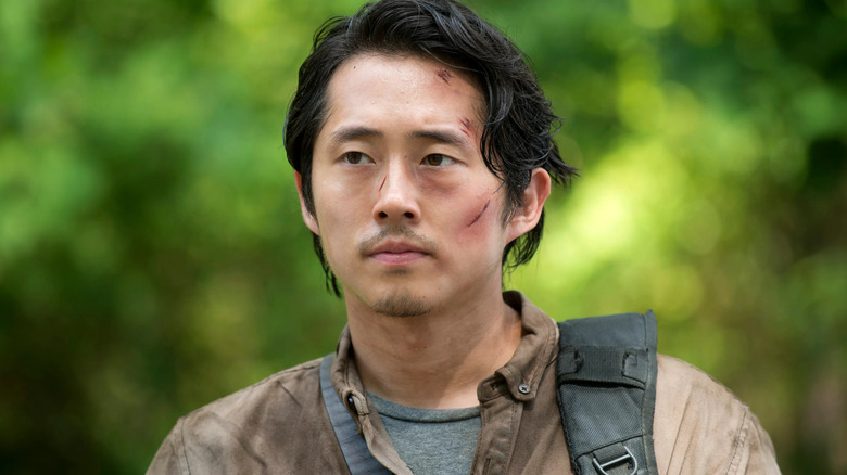 Steven Yeun as Glenn, cut and bloody, on The Walking Dead