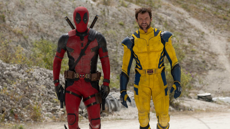 Ryan Reynolds and Hugh Jackman as Deadpool and Wolverine, walking through the wasteland, in Deadpool and Wolverine