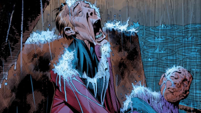 Ralph Dibny holds the corpse of his wife, Sue