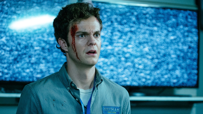 Jack Quaid as Hughie with a bloody head in The Boys