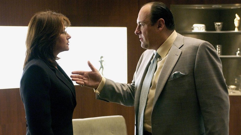 Lorraine Bracco and James Gandolfini as Dr. Melfi and Tony Soprano facing each other in The Sopranos